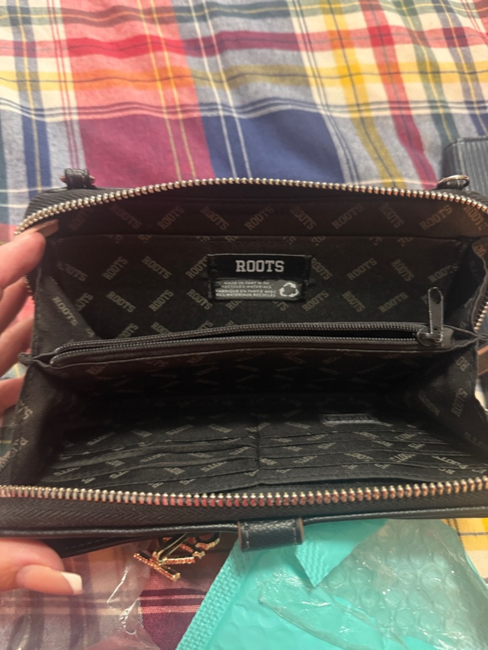 Roots Black Leather Crossbody Wallet with Gold Zipper Detail
